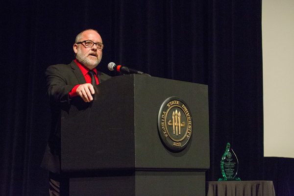 Reb Braddock, dean of the College of Motion Picture Arts, speaks at 8th annual Veterans Film Showcase. (FSU Photography Services)