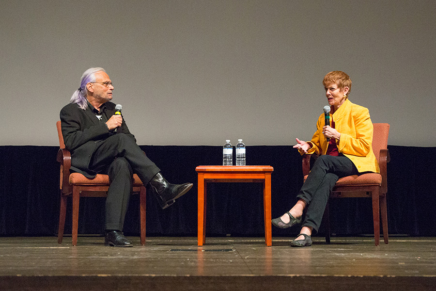 Paul Cohen, executive director of the Torchlight Program, discusses "Memphis Belle" with Catherine Wyler, daughter of filmmaker William Wyler at the 8th annual Veterans Film Showcase. (FSU Photography Services)