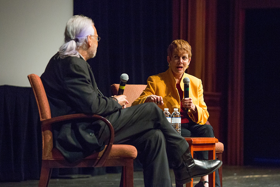 Paul Cohen, executive director of the Torchlight Program, discusses "Memphis Belle" with Catherine Wyler, daughter of filmmaker William Wyler at the 8th annual Veterans Film Showcase. (FSU Photography Services)