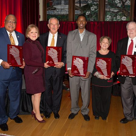 2018 Torch Award winners (from left): Melvin Stith; Nan and Mark Hillis; Charlie Ward; Val Richard Auzenne, accepting for Barry Jenkins; and Don Gibson. (FSU Photography Services)