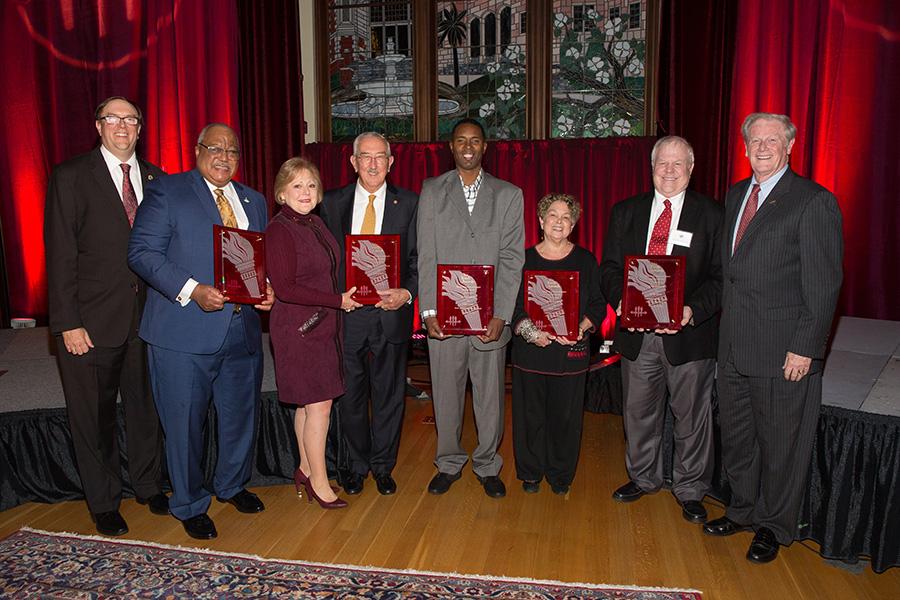 2018 Torch Award winners (from left): Melvin Stith; Nan and Mark Hillis; Charlie Ward; Val Richard Auzenne, accepting for Barry Jenkins; and Don Gibson. (FSU Photography Services)