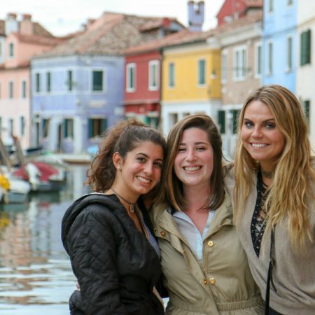 Rozsa Gomory (center) visited Burano, an island of Venice in Italy, with friends Daisy Adkins (right) and Alessandra Cruz during their study-abroad experience. (Photo: Rozsa Gomory)