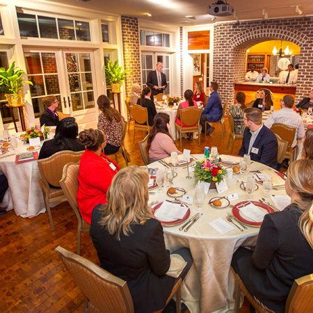 President John Thrasher speaks to the Transformation Through Teaching award winners during a reception and dinner at the President's House Nov. 29, 2018. (FSU Photography Services)