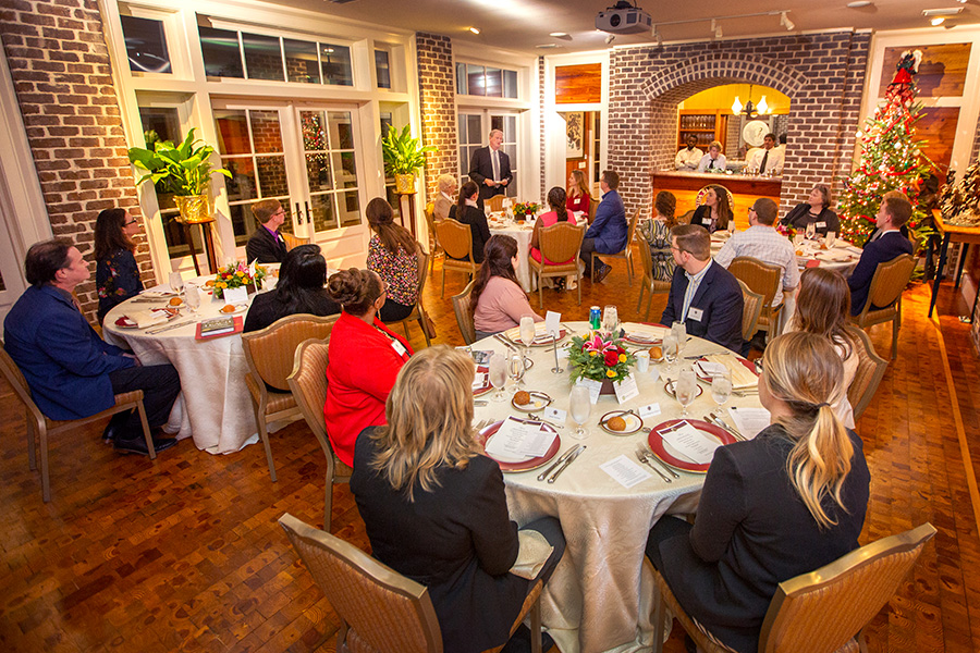 President John Thrasher speaks to the Transformation Through Teaching award winners during a reception and dinner at the President's House Nov. 29, 2018. (FSU Photography Services)