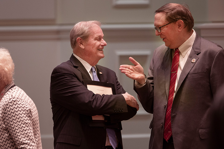 President John Thrasher speaks with FSU Faculty Senate President Todd Adams before the State of the University address Wednesday, Dec. 5, 2018. (FSU Photography Services)