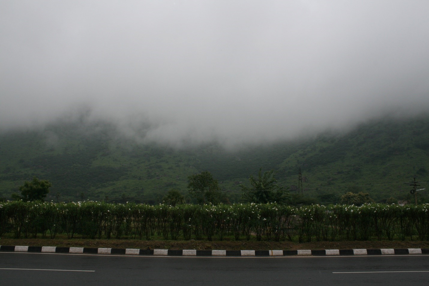 A mist settles over hills in the southern Indian state of Tamil Nadu during the Northeast Indian Monsoon season. Credit: Sara Vankm