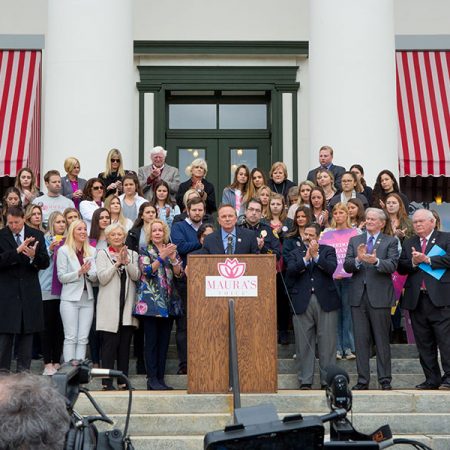 Jeff Binkley addresses attendees at the Maura's Voice announcement Monday, March 4, on the steps of the Florida Historic Capitol. (FSU Photography Services)
