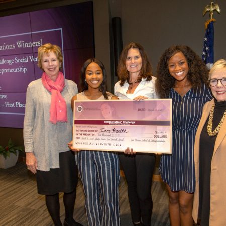 InnoHealth Diagnostics won the Mark K. Scott Infinity Funds $10,000 First Place prize at the InNOLEvation® Challenge. From left to right: Wendy Plant, Angela Udongwo of InnoHealth, Elizabeth Scott (judge), Nkechi Emetuche of InnoHealth and Susan Fiorito. (FSU Photography Services)