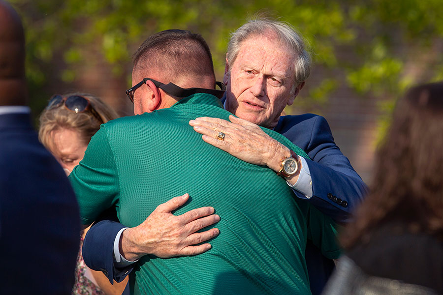 President Thrasher embraces loved ones. (FSU Photo/Bruce Palmer)