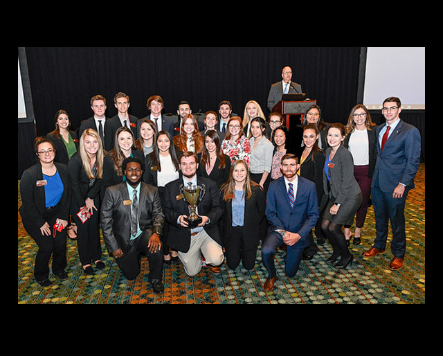 Dedman students receive the 2019 Student Chapter of the Year Award at the 2019 CMAA World Conference & Club Business Expo in Nashville.