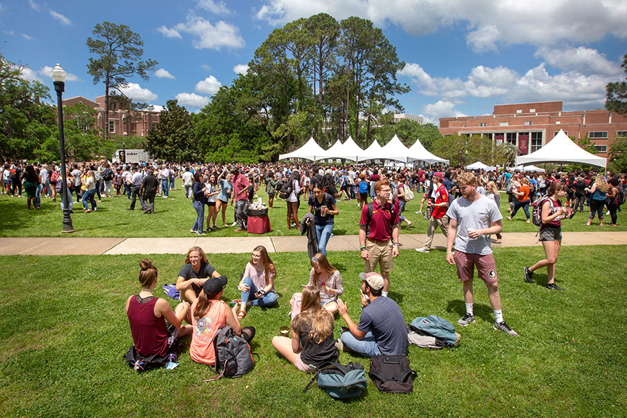 Students enjoying The President's Ice Cream Social on Landis Green, April 10, 2019. (FSU Photography Services)