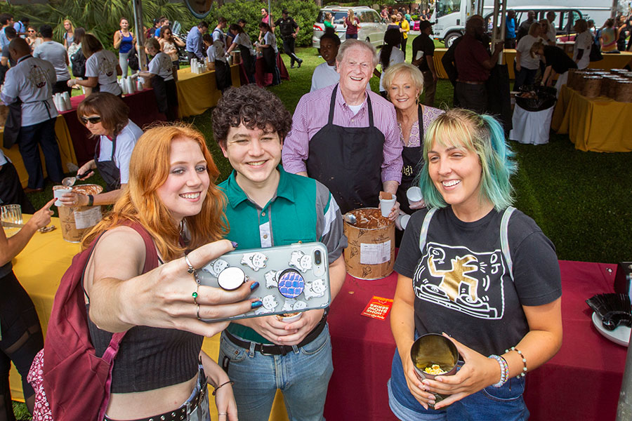 Students take a selfie with FSU President John Thrasher and First Lady Jean Thrasher at The President's Ice Cream Social on Landis Green, April 10, 2019. (FSU Photography Services)