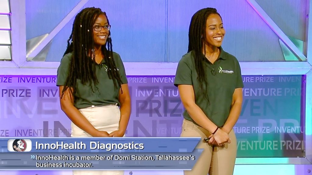 FSU's Nkechi Emetuche and Angela Udongwo pitch their business InnoHealth Diagnostics to a panel of judges during the 2019 ACC InVenture Prize competition in Raleigh, North Carolina. (Georgia Public Broadcasting)