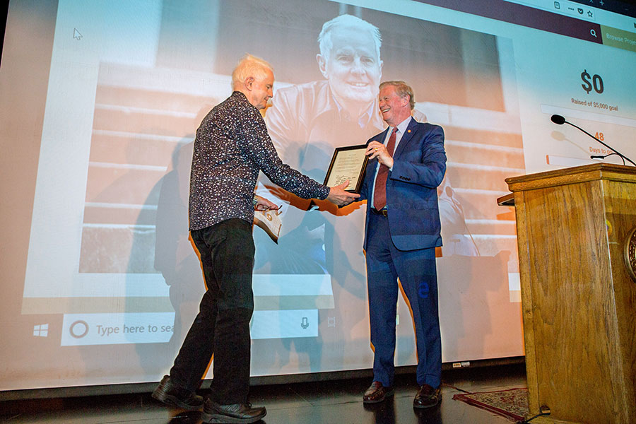 President Thrasher recognizes David Kirby at the annual English department awards, April 12, 2019. (FSU Photography Services)