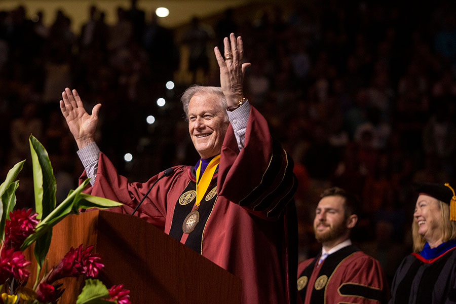 FSU President John Thrasher shares a fun moment with members of the 2019 spring graduating class. (FSU Photography Services)