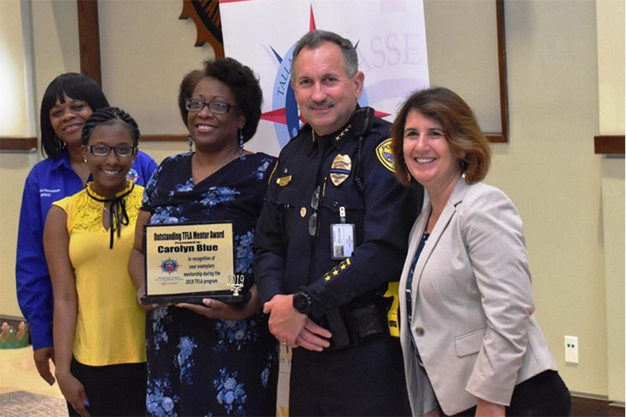 The College of Medicine's Carolyn Blue (center) was selected for one of four Outstanding Mentor Awards by the Tallahassee Future Leaders Academy.