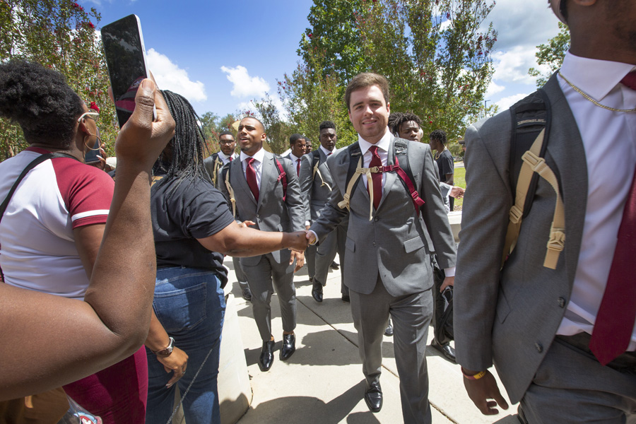 FSU Football players greet fans at the Legacy Team Walk before the Louisville game Sept. 21, 2019. (FSU Photography Services)