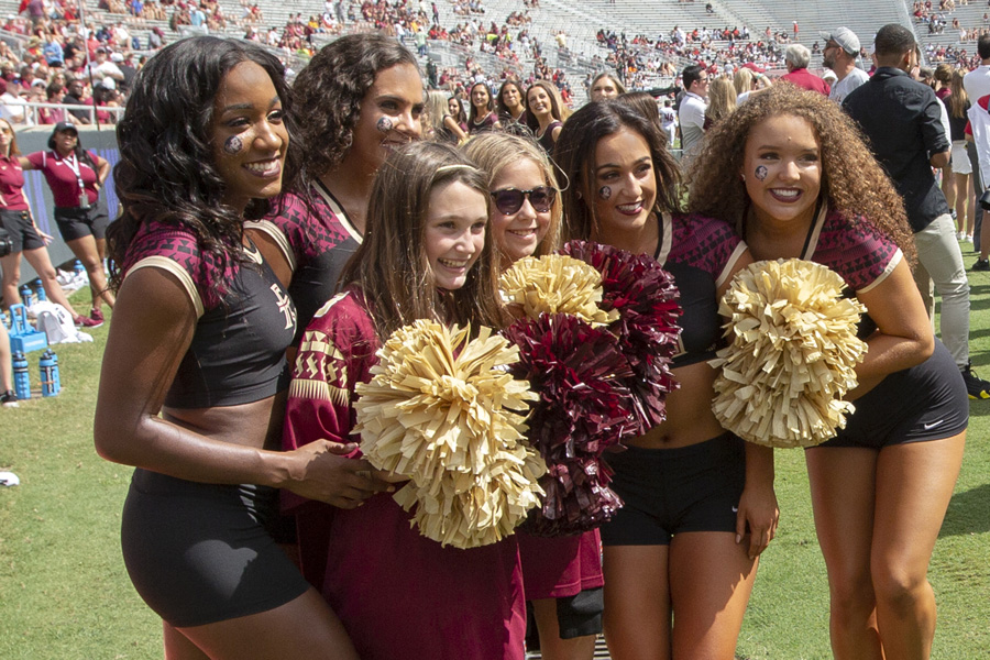 FSU Golden Girls pose with fans before the Louisville game Sept. 21, 2019. (FSU Photography Services)