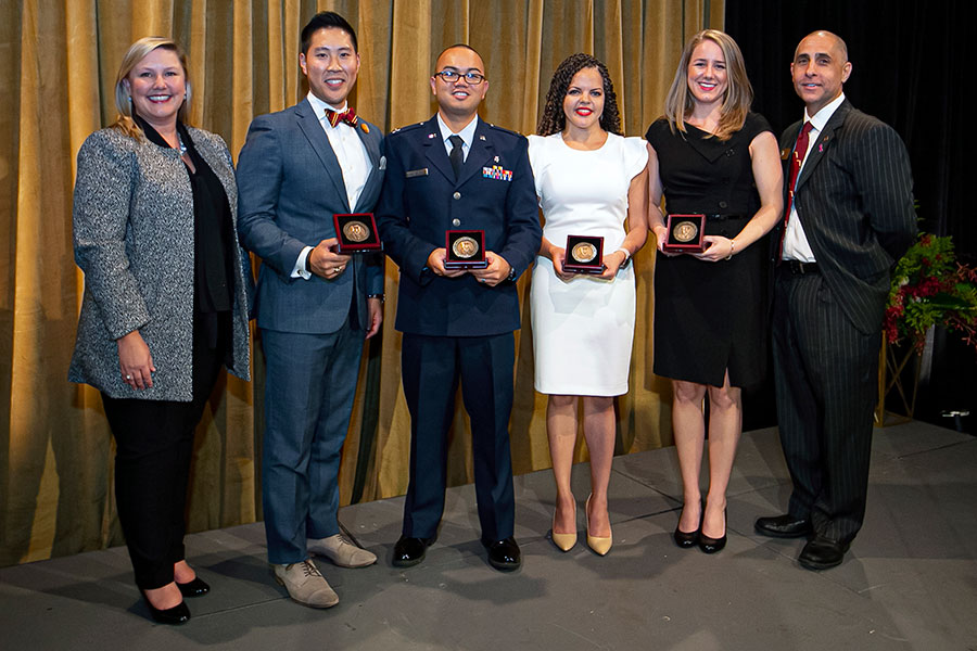 From left: FSU Alumni Association President and CEO Julie Cheney with 2019 Reubin O’D. Askew awardees Zach Heng, Captain Danilo Belarmino, Aurélie Mathieu and Ashley Russell and chair of the National Board of Directors Sam Ambrose. (Photo by Steve Chase)