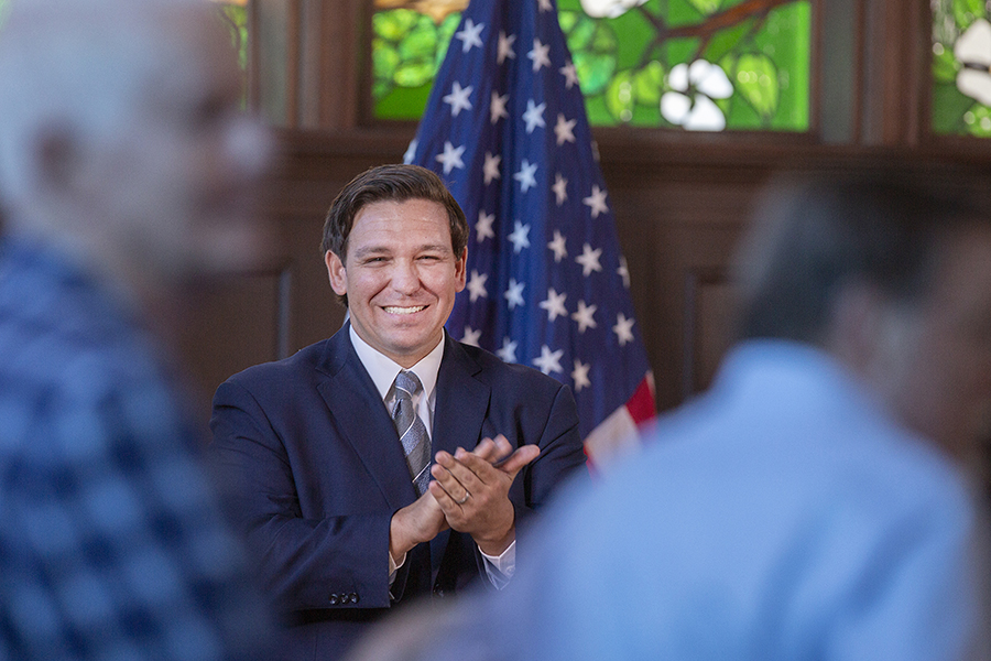 Gov. Ron DeSantis applauds FSU's faculty, staff and students on the university's rise to No. 18 in the U.S. News & World Report rankings of national public universities during a news conference Sept. 9, 2019. (FSU Photography)