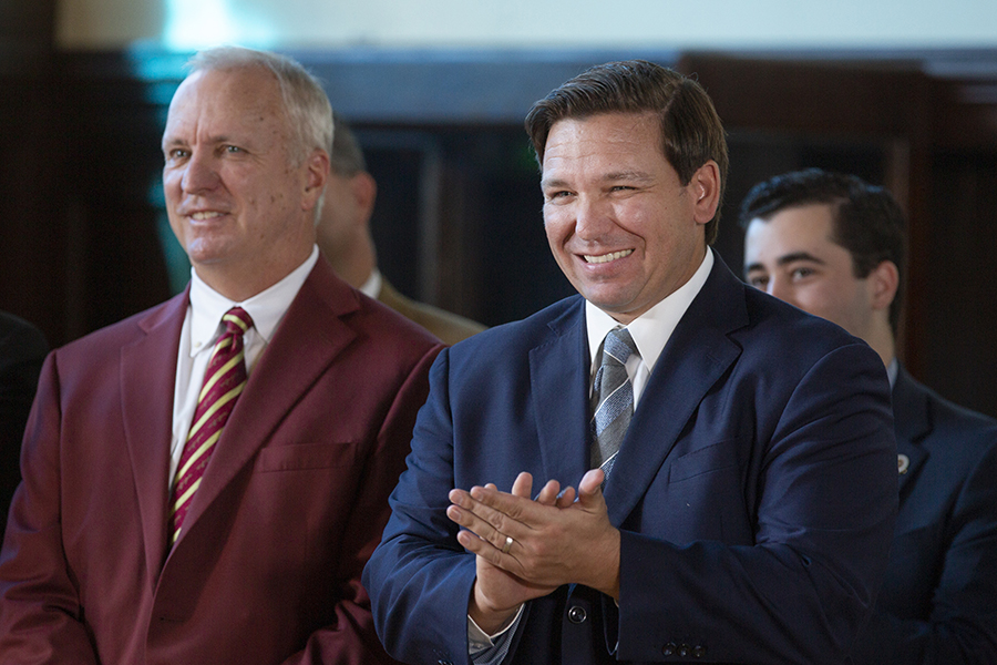 Gov. Ron DeSantis applauds FSU's faculty, staff and students on the university's rise to No. 18 in the U.S. News & World Report rankings of national public universities during a news conference Sept. 9, 2019. (FSU Photography)