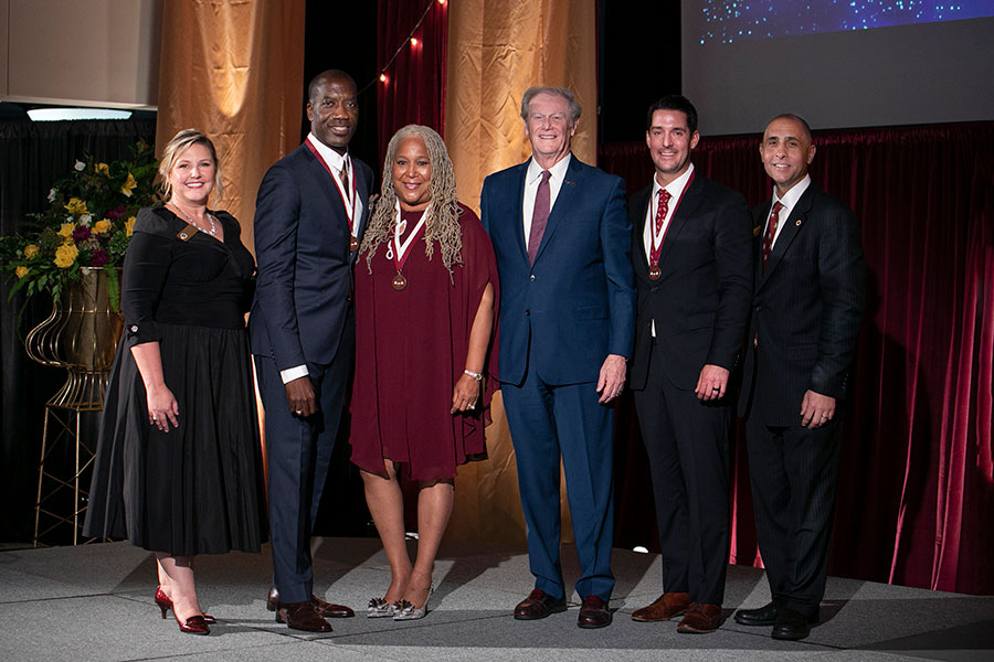 FSU Alumni Association President Julie Cheney, Keith Carr, Doby Flowers, President John Thrasher, J.D. Doughney and Alumni National Board of Directors Chair Sam Ambrose.