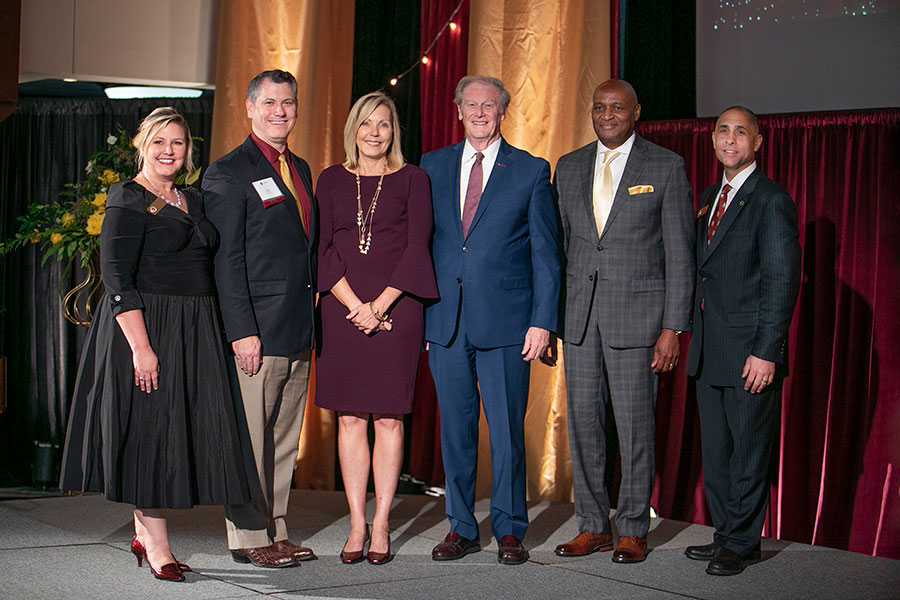 FSU Alumni Association President Julie Cheney, D.J. Kennedy, Myrna Hoover, President John Thrasher, Arthur Fleming and Alumni National Board of Directors Chair Sam Ambrose.