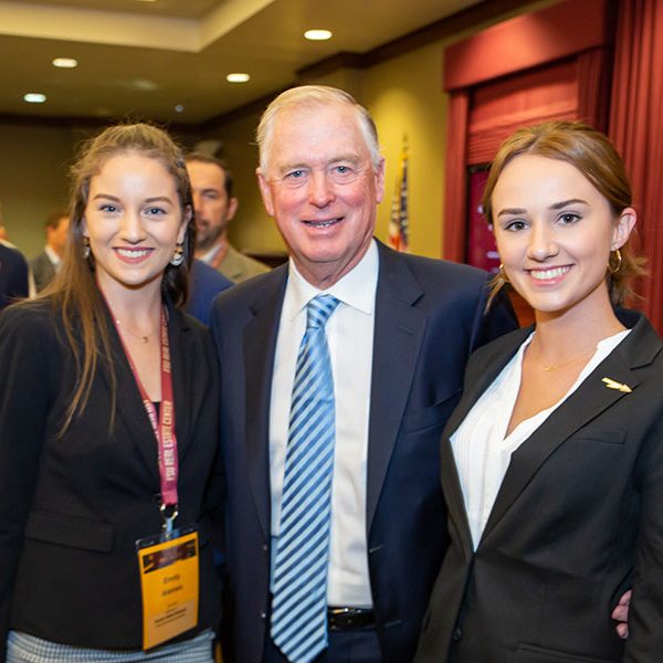 Dan Quayle, former vice president of the United States, poses with students at the FSU Real Estate Center's 25th Real Estate TRENDS Conference.
