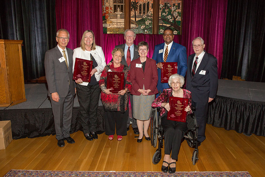 2019 FSU Torch Awards recipients. From left: Steven High, executive director of The Ringling, and Provost Sally McRorie, accepting for Howard Tibbals; Valliere Richard Auzenne; President John Thrasher; FSU Faculty Senate President Kris Harper; Sean PIttman; and Persis and Charles Rockwood.