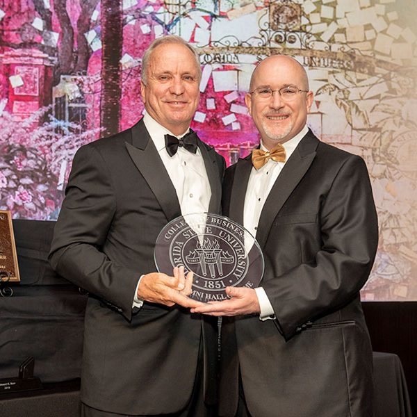 Michael Hartline, dean of the College of Business, and Ed Burr, president and CEO of GreenPointe Holdings, LLC and chair of the FSU Board of Trustees, who was inducted into the FSU College of Business’ Alumni Hall of Fame on Thursday evening.