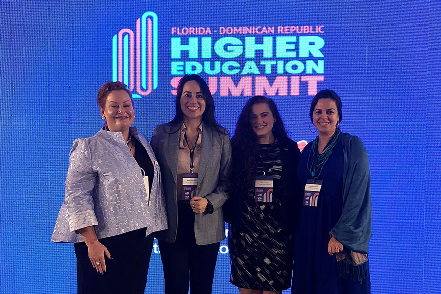 (From left) Professor Audrey Casserleigh, Florida A&M faculty member Paula Gomez, FSU doctoral student Becca Rogers, Associate Professor Lara Perez-Felkner (far right) with colleagues at the Florida-Dominican Republic Higher Education Summit.