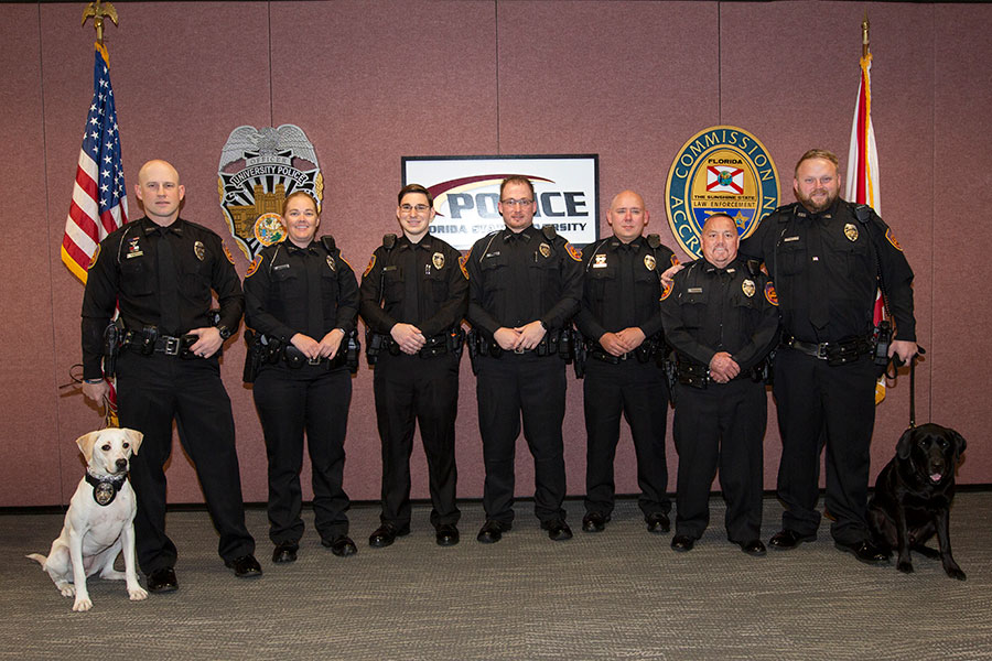FSUPD swears in five new officers and two K-9s. From left: Chase Yarborough with K-9 Nera, Tiffany Spears, Craig Kistner, David Taczak, Matt Hedges, John Beeman and Adam Walker with Tomahawk. 2020
