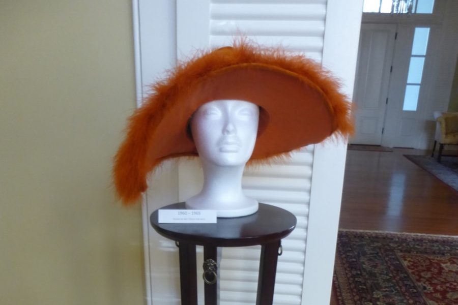 “Orange!” Schofield said of this “slouch” hat, which dates to the 1960s. “It’s kind of wrinkled, kind of slouchy. It’s got some feathers on it. But in thinking about the 1960s, you’ve got long, straight hair. It’s not dissimilar from the 1920s with no-volume hair.”