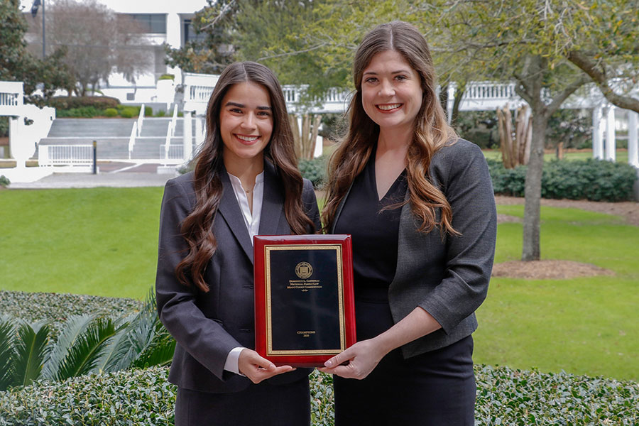 The winning moot court team members, from left: Gabriela De Almeida and Hannah DuShane.