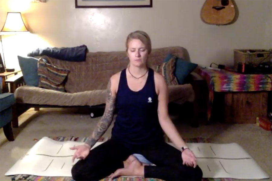 Instructor Alex Nolte teaches her yoga class remotely.