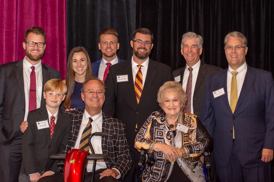 Members of the Day family from left to right: Philip Day, Dean Day, Caroline Delorenzo, Clint Day, Richard Delorenzo, Brandon Day, Deen Day Sanders, Woody White, President of the Cecil B. Day Foundation and Parke Day