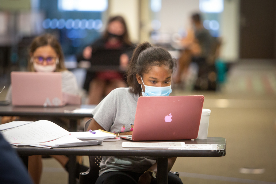 Students follow the mask requirement while studying at Strozier Library during the Fall 2020 semester (FSU Photography Services)