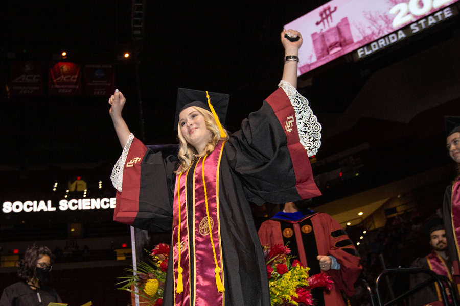 A graduate celebrates at FSU Spring Commencement Friday, April 23, 2021. (FSU Photography Services)