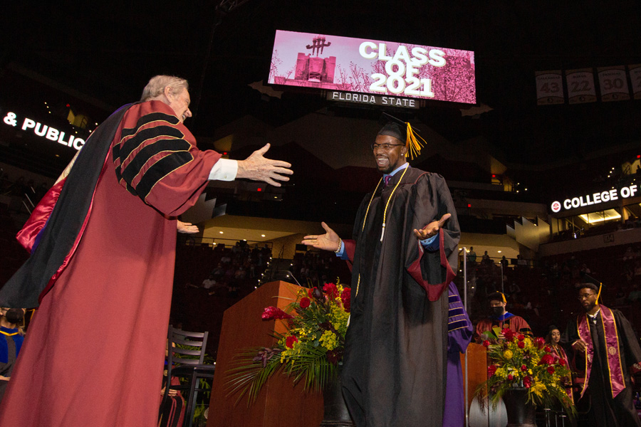 President Thrasher congratulates men's basketball player Malik Osborne on receiving his bachelor's degree during FSU Spring Commencement Friday, April 23, 2021. (FSU Photography Services) 2021