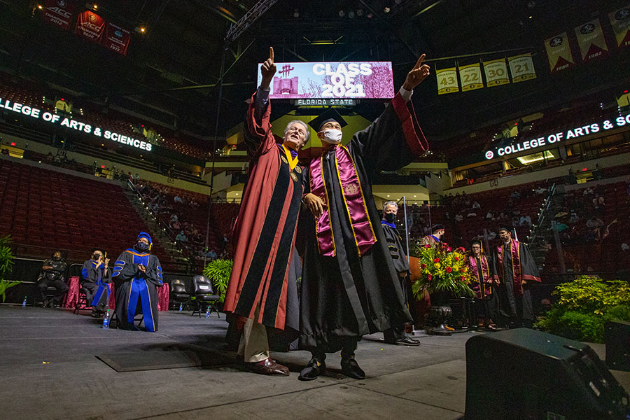 President John Thrasher congratulates graduate Vance Carlton Wiggins II, Mrs. Eva Killings' grandson, during the 2 p.m. spring commencement ceremony Saturday, April 17, 2021, at the Donald L. Tucker Civic Center. (FSU Photography Services)