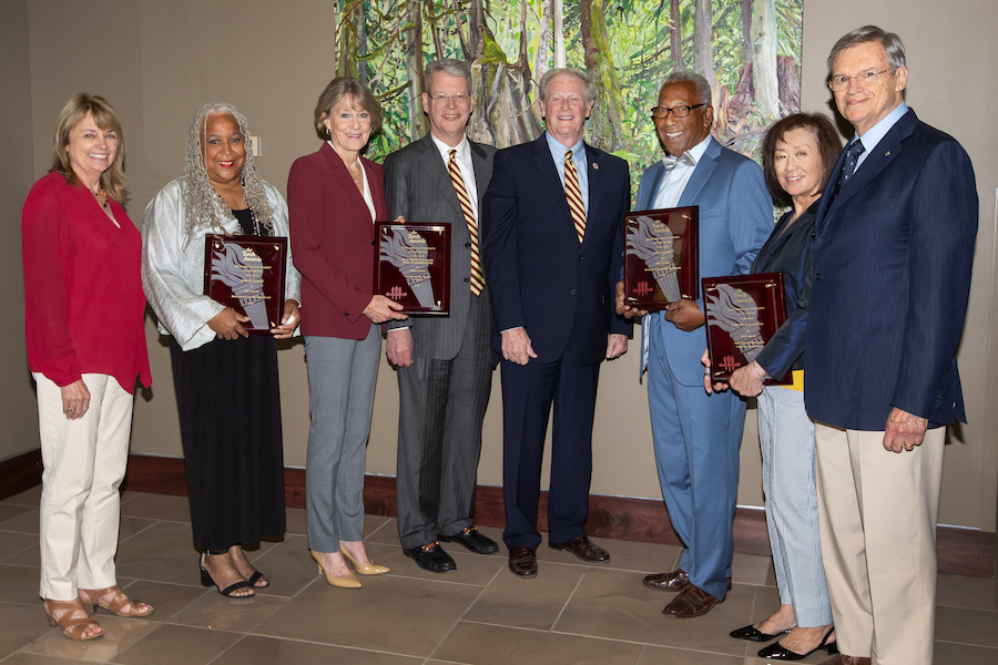 From left to right: Janet Kistner, vice president for faculty development and advancement, Doby Flowers, Paula Peters Smith, Bill Godfrey Smith, John Thrasher, Fred Flowers, Dorothy Jenkins and her husband Charles Jenkins.