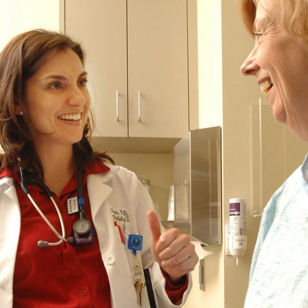 In this file photo, Dr. Christie Alexander, an associate professor at the Florida State University College of Medicine, visits a patient. (Florida State University)