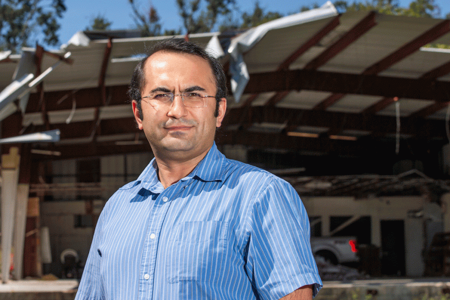 FAMU-FSU College of Engineering associate professor of Civil and Environmental Engineering Eren Erman Ozguven near the damage from Hurricane Michael in the north Florida panhandle. Ozguven is the director of the Resilient Infrastructure & Disaster Response Center, a multidisciplinary research center at the FAMU-FSU College of Engineering with the mission of achieving adaptive capacity and resilience for the communities affected by natural disasters such as hurricanes and the COVID-19 pandemic. (Mark Wallheiser/FAMU-FSU College of Engineering)