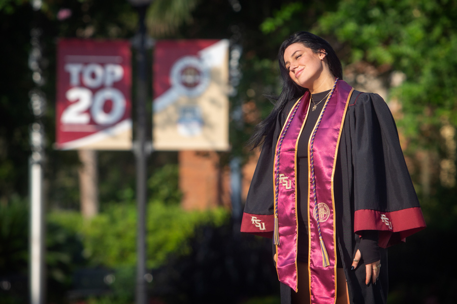 Summer graduates have photos taken in Westcott Plaza before this afternoon and this evening's commencement ceremonies. (FSU Photography Services)