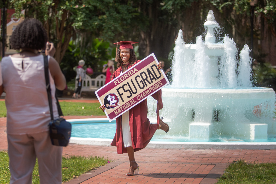 FSU graduates celebrate their farewell on Westcott Plaza after commencement ceremonies Friday at the Tucker Civic Center. (FSU Photography Services)