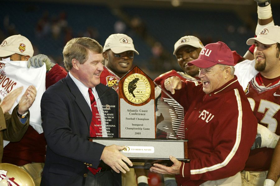 Former ACC Commissioner John Swofford awards Coach Bowden the inaugural ACC Championship Game trophy after the Seminoles defeated Virginia Tech, 27-22, on Dec. 3, 2005, in Jacksonville, Florida. (FSU Photography Services)