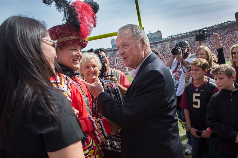 Coach Bowden greets members of the Seminole Tribe of Florida during a return visit to Doak Campbell Stadium in 2015. (FSU Photography Services)