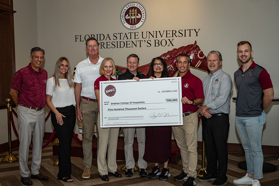 From left to right: Andy A. Jhanji, Interim Vice President for University Advancement; Amanda Manning, Hospitality and Tourism senior; Jay Johnson (’87), Region President, RNDC West; Jenn Engel (’97), Senior Vice President National Accounts, RNDC; FSU President Richard McCullough; FSU First Lady Dr. Jai Vartikar; Dave Lane (’91), Senior Vice President National Accounts, RNDC; Dr. Don Farr, Dean of Dedman College of Hospitality; Brandon Smith, Hospitality and Tourism senior.