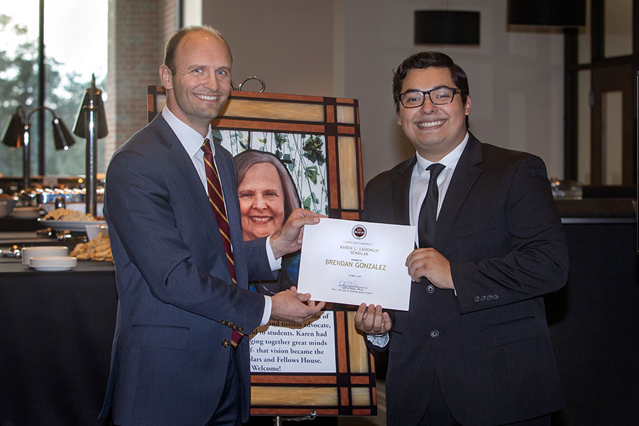 Associate Provost Joe O’Shea, who succeeded Laughlin as dean of Undergraduate Studies, presented the inaugural Karen Laughlin scholarship to Brendan Gonzalez, a hospitality and tourism student. 