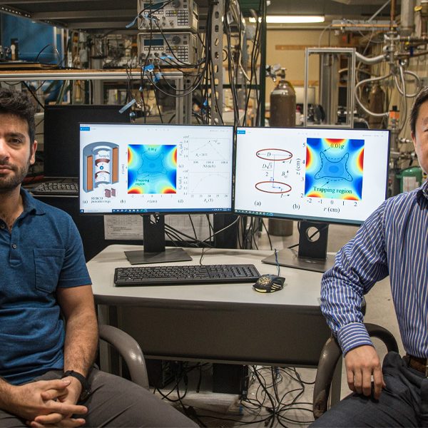 From left, doctoral student Hamid Sanavandi and Associate Professor Wei Guo, co-atuhors on a paper published in npj Microgravity that describes a new design for a magnetic levitation-based simulator that creates a low-gravity environment. (Stephen Bilenky/National MagLab)